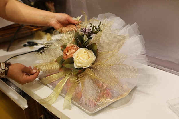 A woman decorating modern chocolate salver