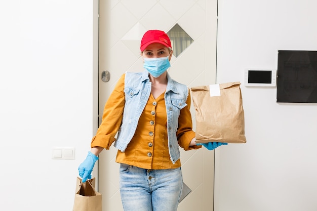 Woman delivering food delivery home