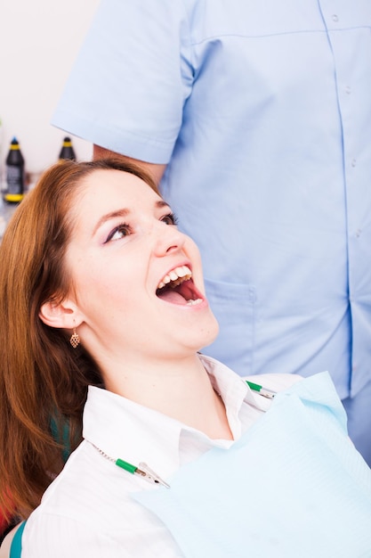 Woman in a Dentist office on the consultation