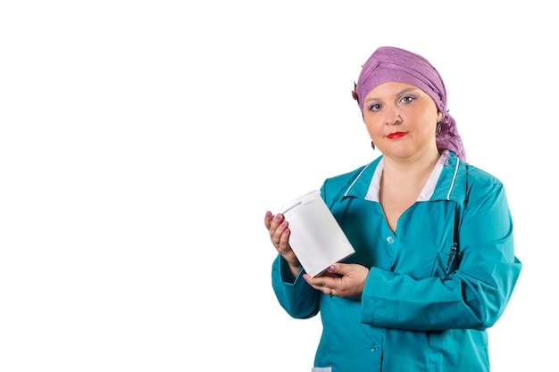 Woman depilation master in a medical uniform with a jar of sugar paste in her hands save a place