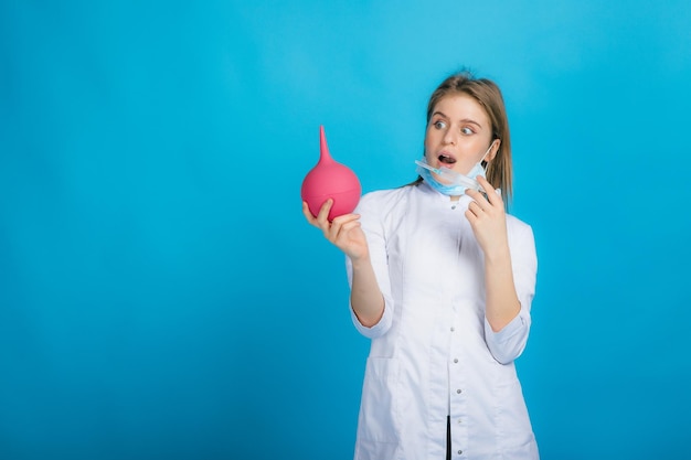 Woman doctor on blue background