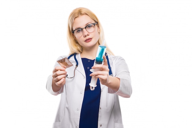 Woman doctor hold condom and injection