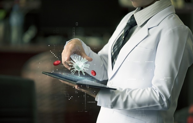 Photo woman doctor holding hand on device with holographic virus