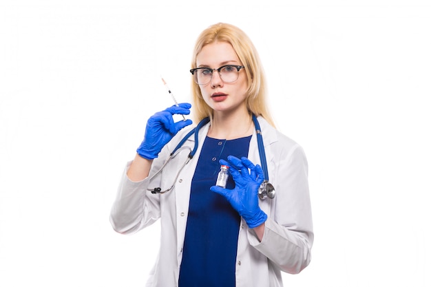 Woman doctor holds injection