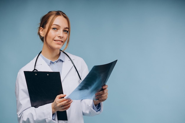 Woman doctor looking at xray picture