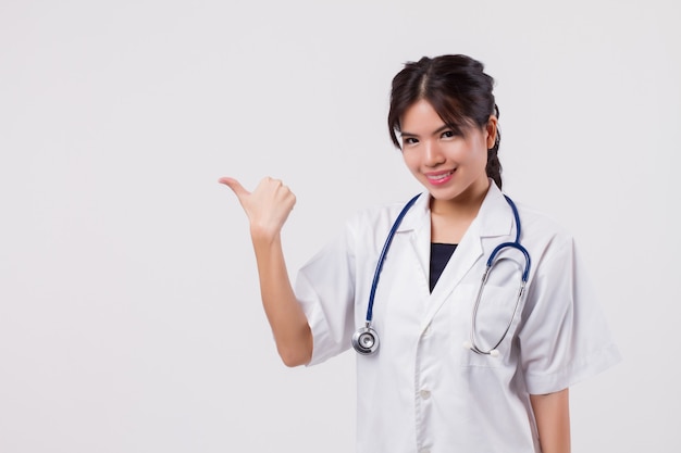 Woman doctor pointing thumb up gesture