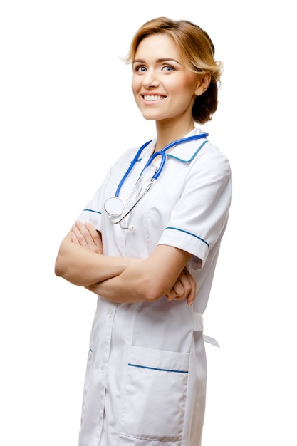 Woman doctor standing on white background