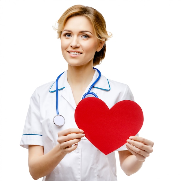 Woman doctor standing on white background