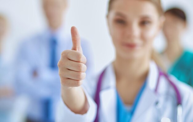 Woman doctor standing with stethoscope at hospital,