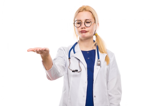 Woman doctor in white coat demands bribe