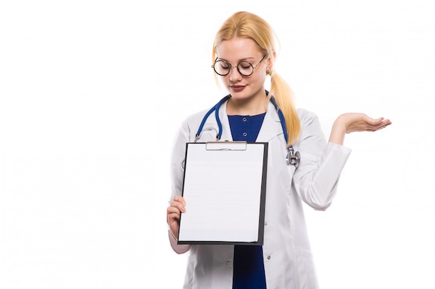 Woman doctor in white coat with clipboard