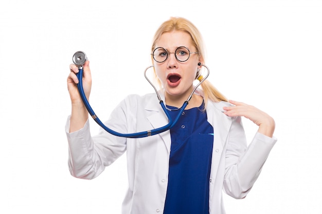 Woman doctor in white coat with stethoscope