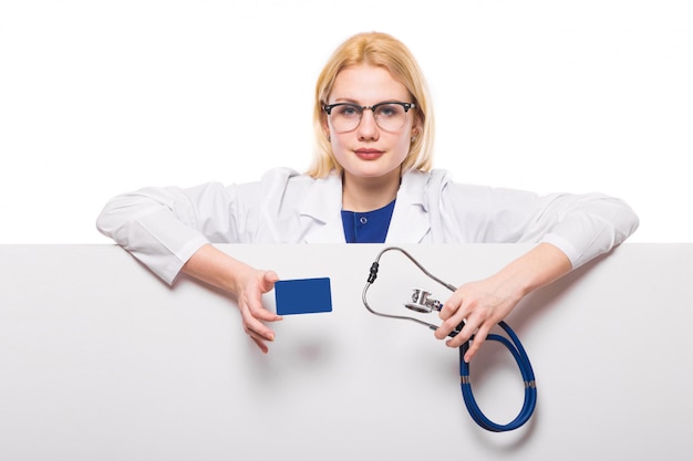 Woman doctor with stethoscope and business card