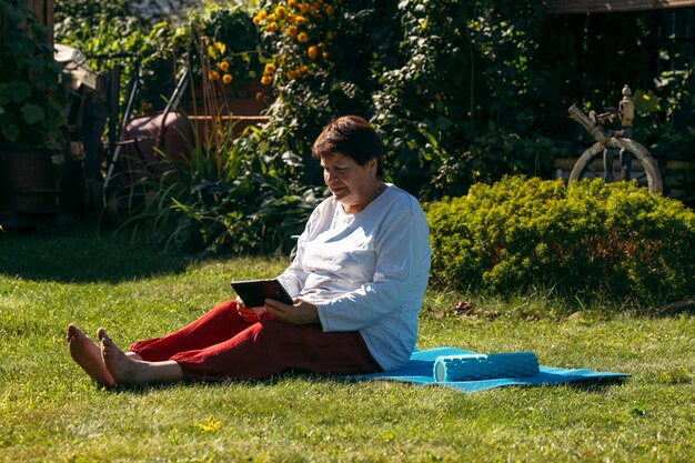 a woman does sports on the grass