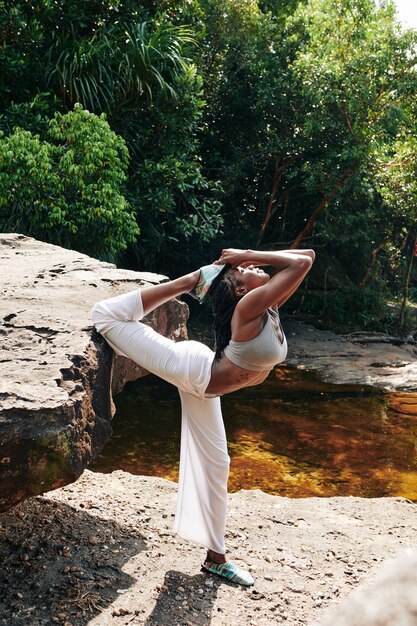 Woman doing advanced yoga backbends