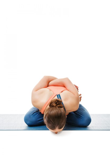 Woman doing asana Yoga mudrasana