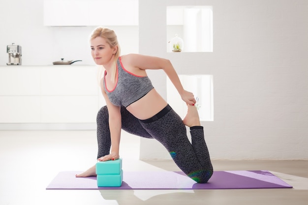 woman doing exercises at home