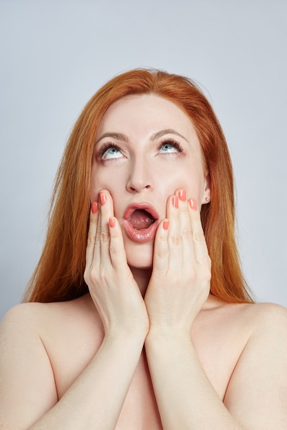 Woman doing facial massage, gymnastics, massage lines and plastic mouth eyes and nose.