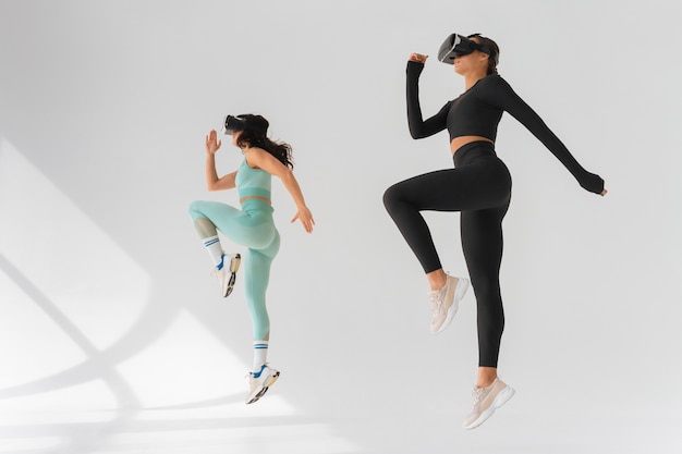 Woman  doing fitness with vr glasses