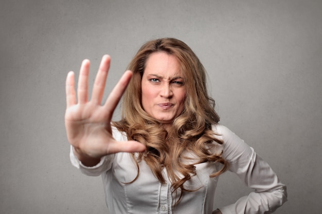 woman doing gesture of rejection