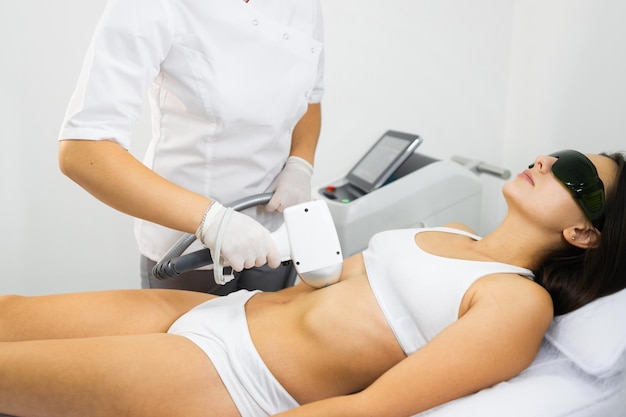 Woman doing laser hair removal