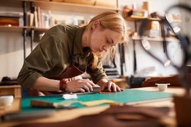 Woman doing Leatherwork