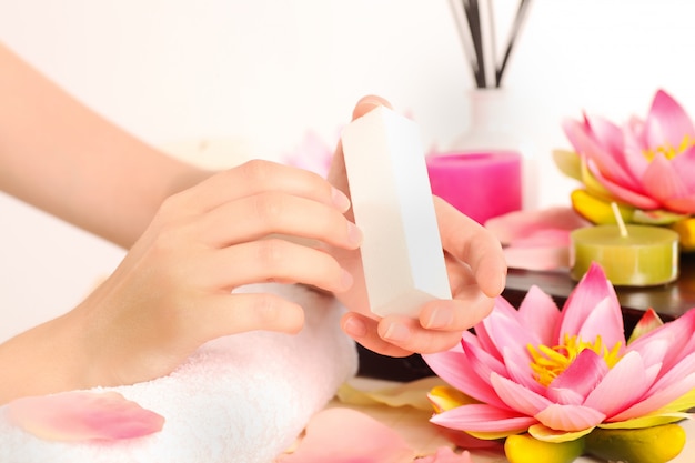 Woman doing manicure