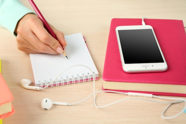 Woman doing paperwork on the desk