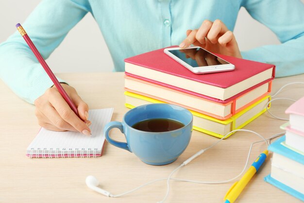 Woman doing paperwork on the desk