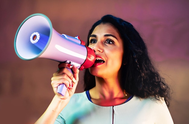 a woman doing a promotion using the loudspeaker