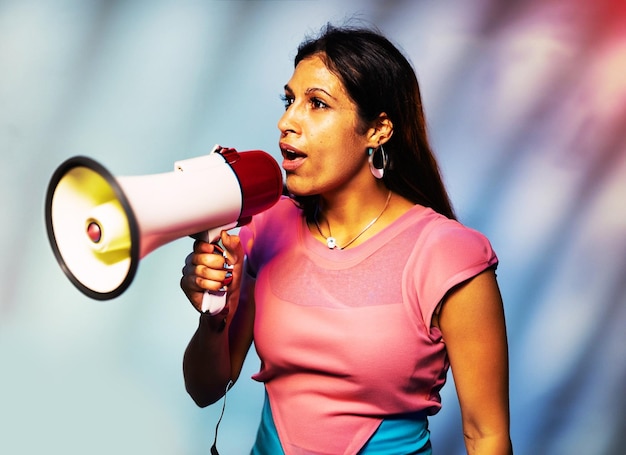 a woman doing a promotion using the loudspeaker