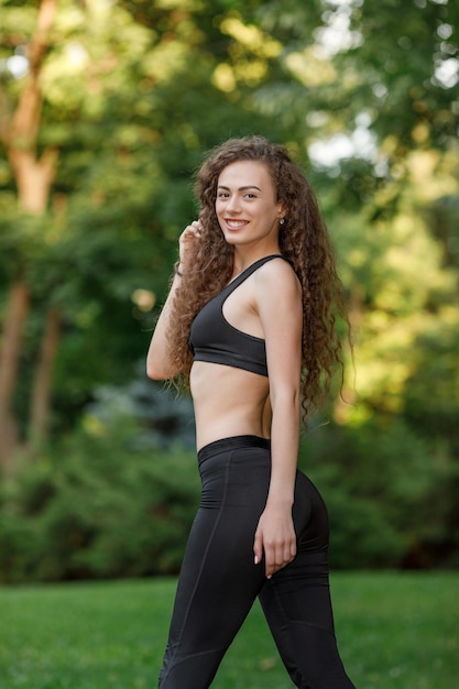 Woman doing stretching exercises before running