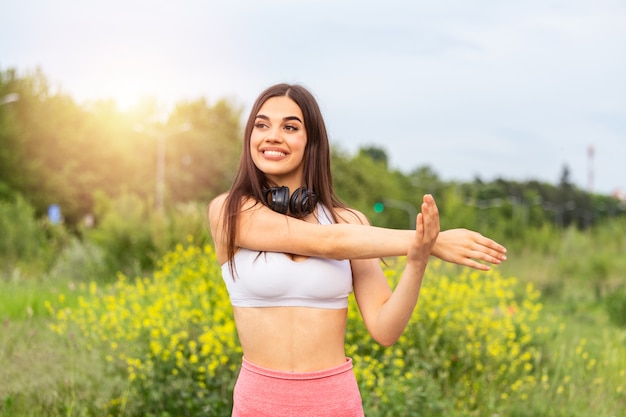 Woman Doing Workout Exercises On Street