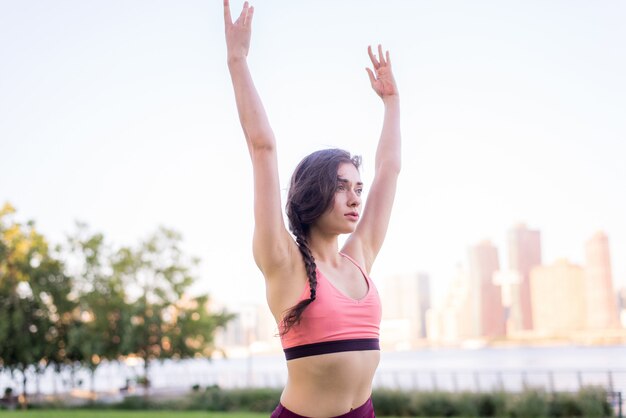 Woman doing yoga in a park