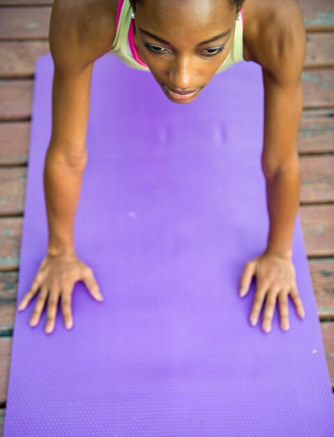 Woman doing yoga at the park