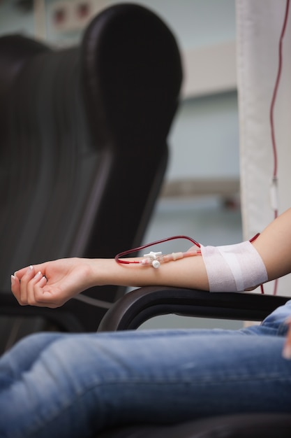 Woman donating blood