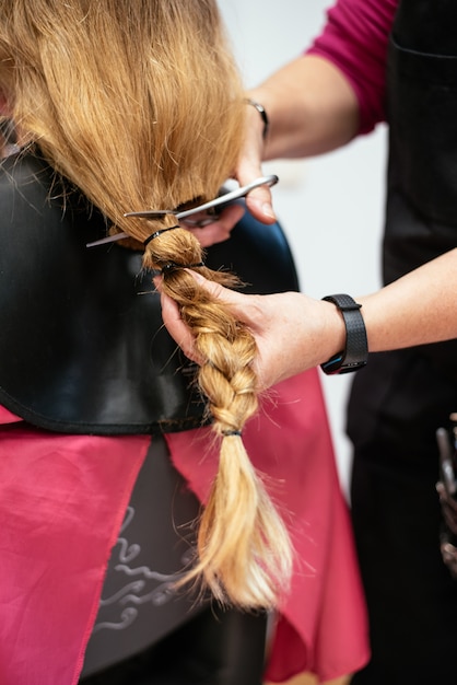 Woman donating hair for cancer