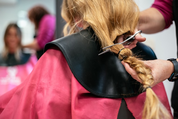 Woman donating hair for cancer