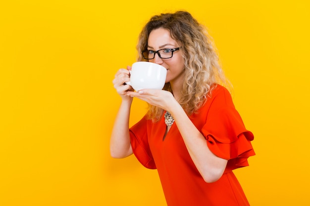 Woman in dress with cup