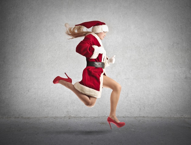 Woman dressed like Santa run