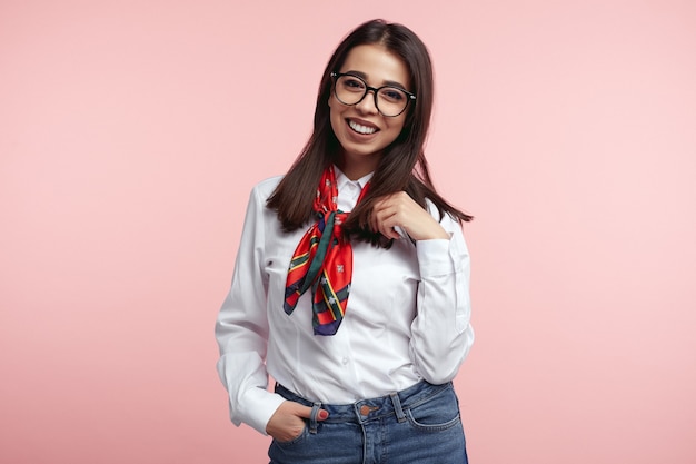 Woman dressed in white shirt smiling