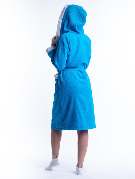 Woman in a dressing gown from the back on an isolated white background