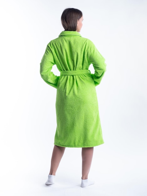 Woman in a dressing gown from the back on an isolated white background