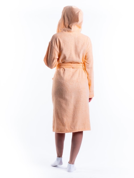 Woman in a dressing gown from the back on an isolated white background