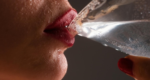 Woman drink cocktail close up wet sexy lips young girl drinking red lip cocktail closeup