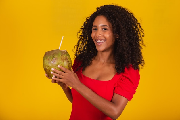 Woman drinking a coconut water