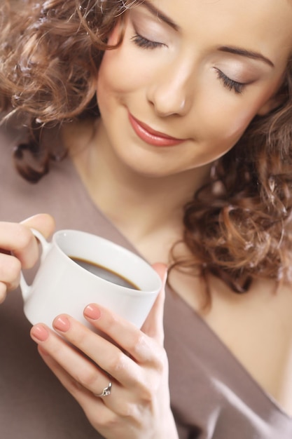 Woman drinking coffee