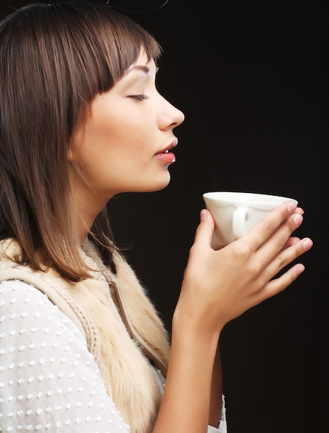 Woman drinking coffee