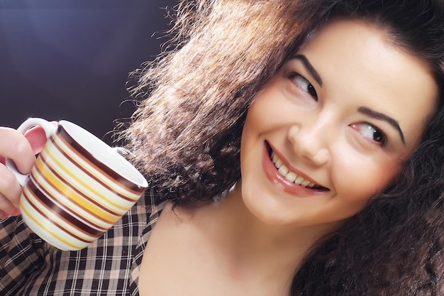 Woman drinking coffee