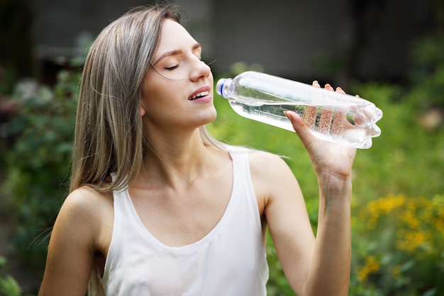 Woman drinks water